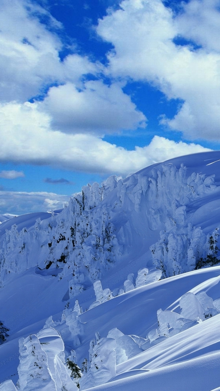 Snow Covered Mountain Under White Clouds and Blue Sky During Daytime. Wallpaper in 750x1334 Resolution