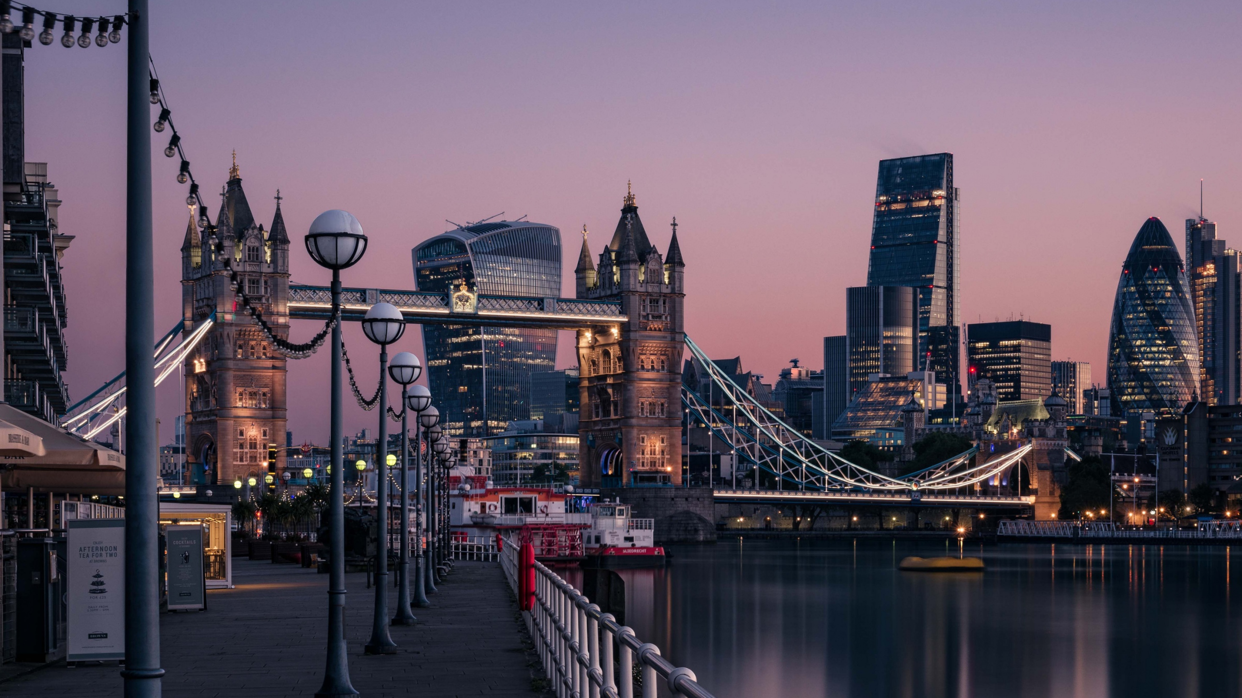 Bridge Over River Near City Buildings During Daytime. Wallpaper in 2560x1440 Resolution