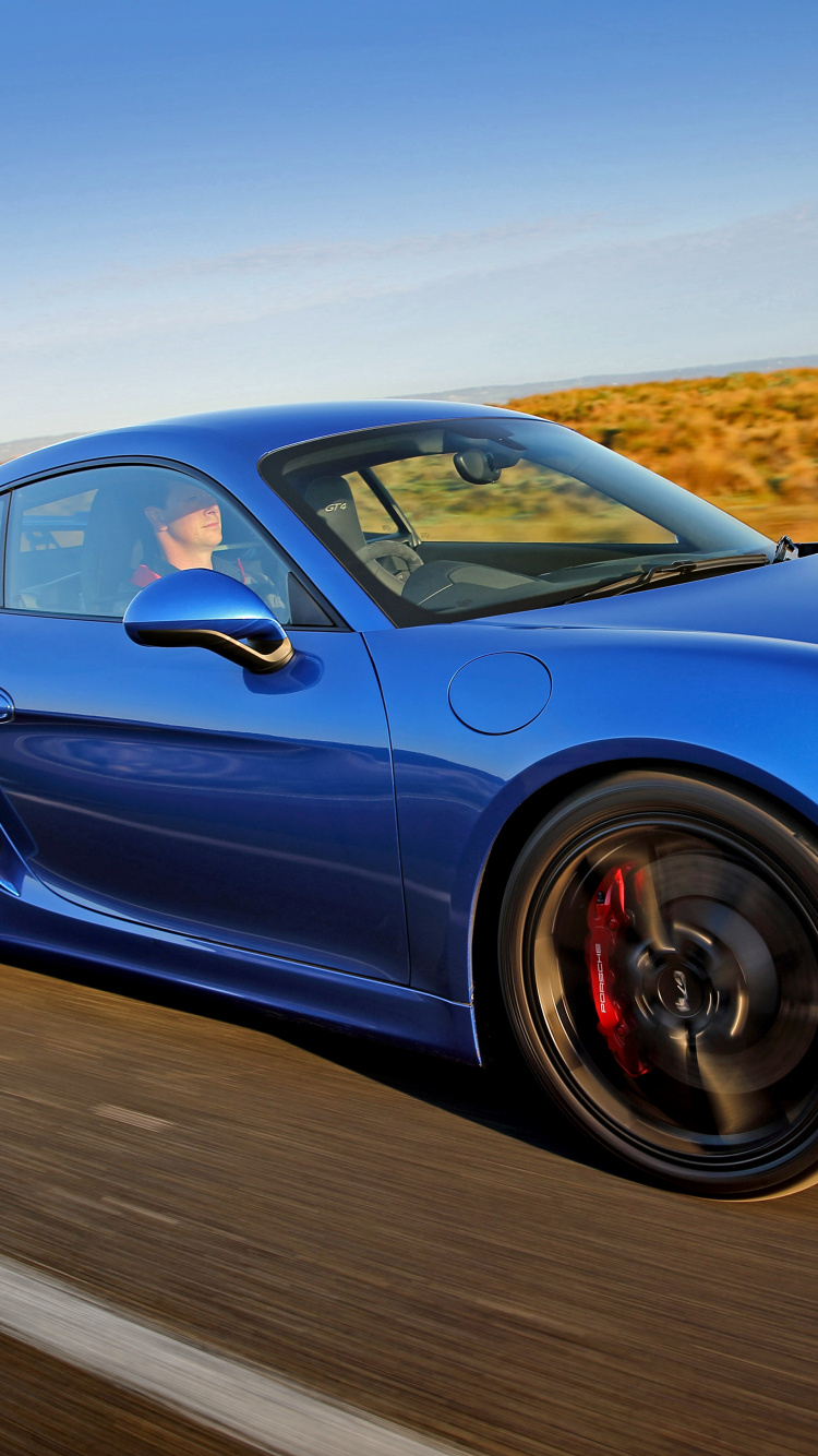 Blauer Porsche 911 Tagsüber Unterwegs. Wallpaper in 750x1334 Resolution