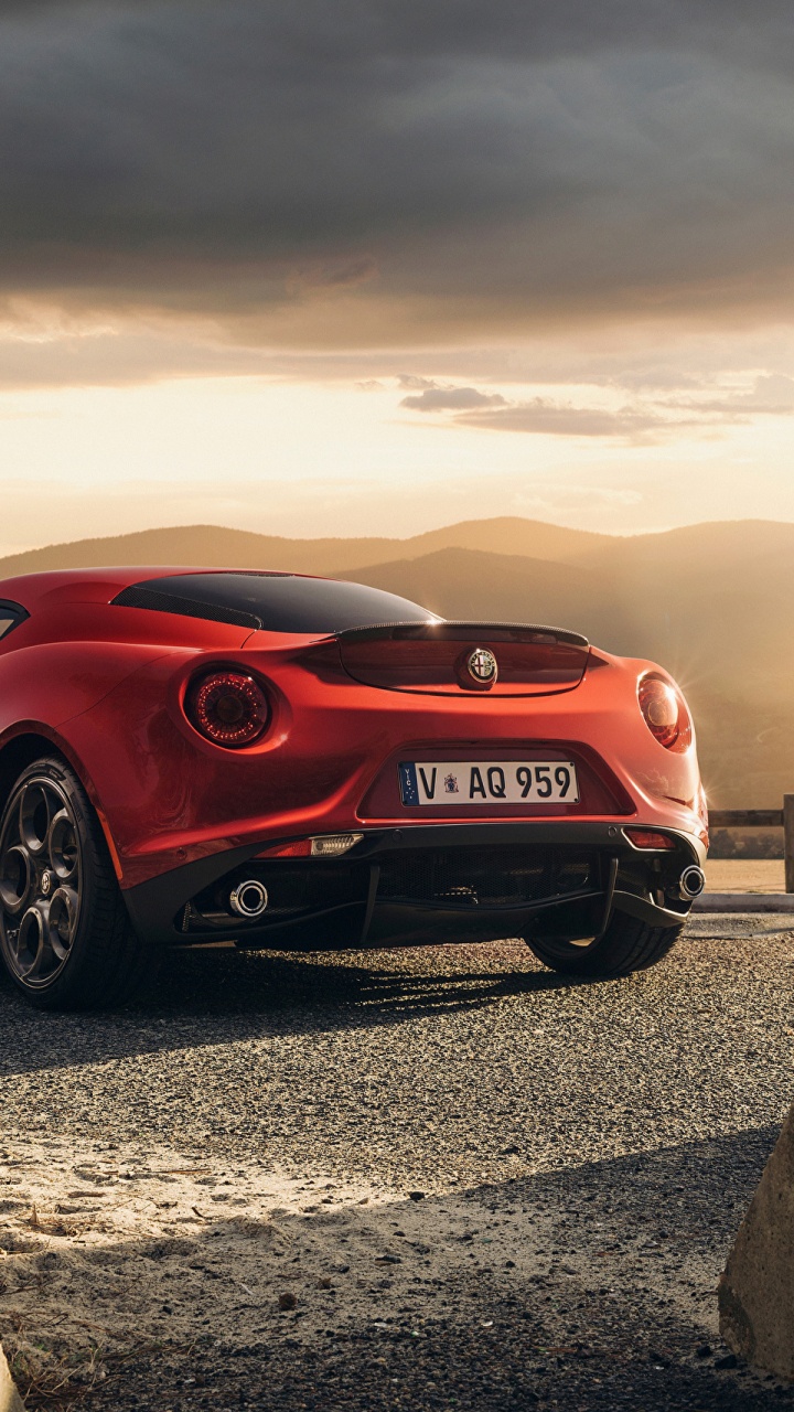 Red Porsche 911 on Gray Sand During Daytime. Wallpaper in 720x1280 Resolution