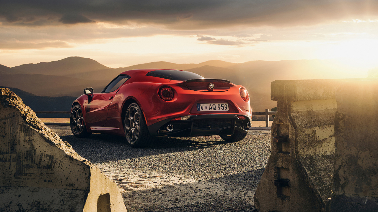 Porsche 911 Rouge Sur Sable Gris Pendant la Journée. Wallpaper in 1280x720 Resolution
