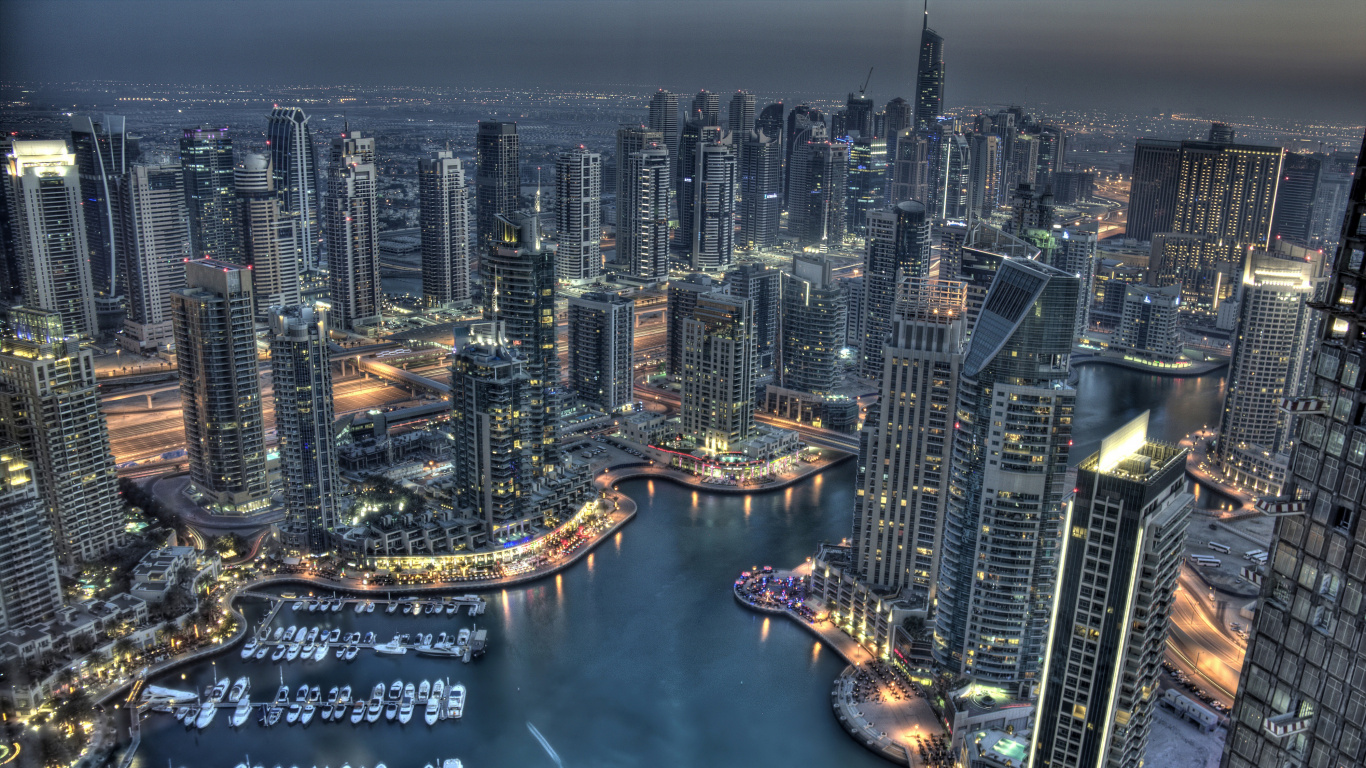 Vista Aérea de Los Edificios de la Ciudad Durante la Noche.. Wallpaper in 1366x768 Resolution