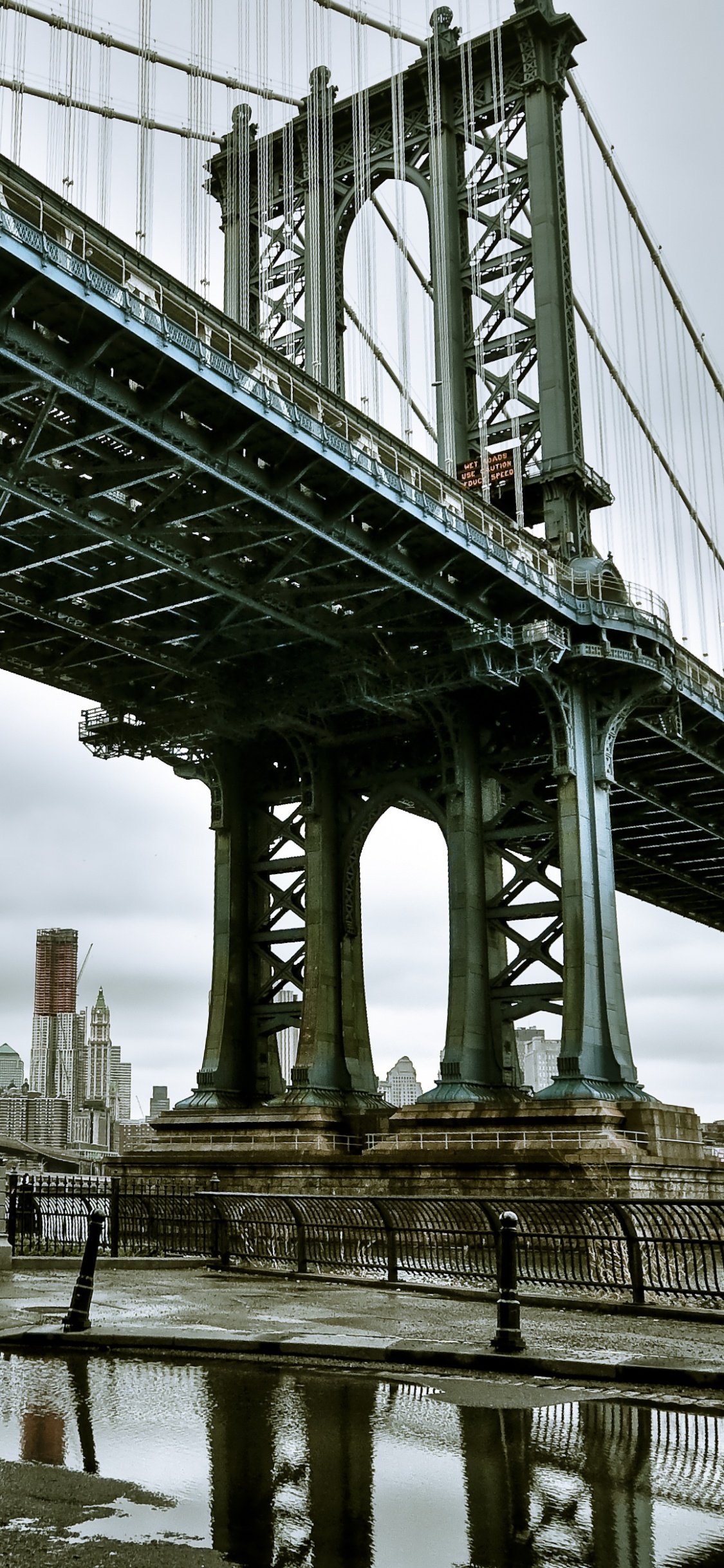 Gray Concrete Bridge Under White Sky During Daytime. Wallpaper in 1125x2436 Resolution