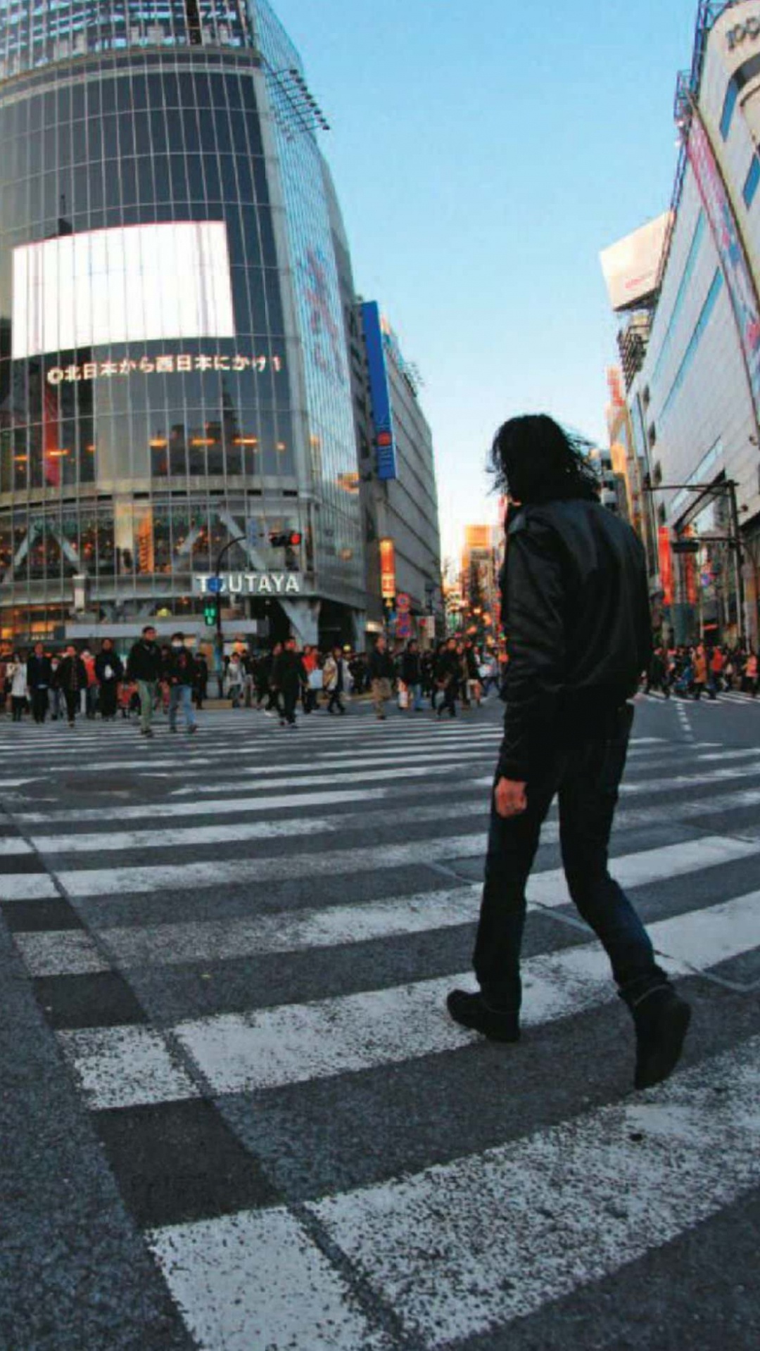 Man in Black Jacket Walking on Pedestrian Lane During Daytime. Wallpaper in 1080x1920 Resolution