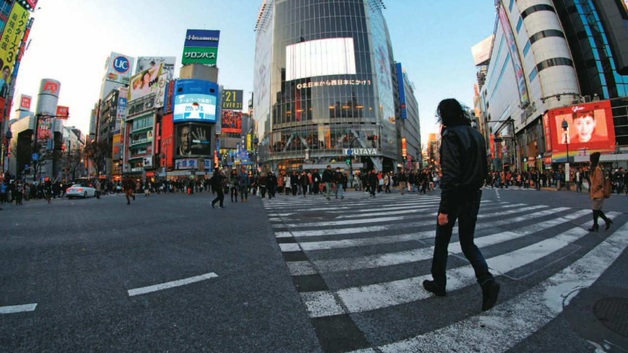 Man in Black Jacket Walking on Pedestrian Lane During Daytime. Wallpaper in 1280x720 Resolution