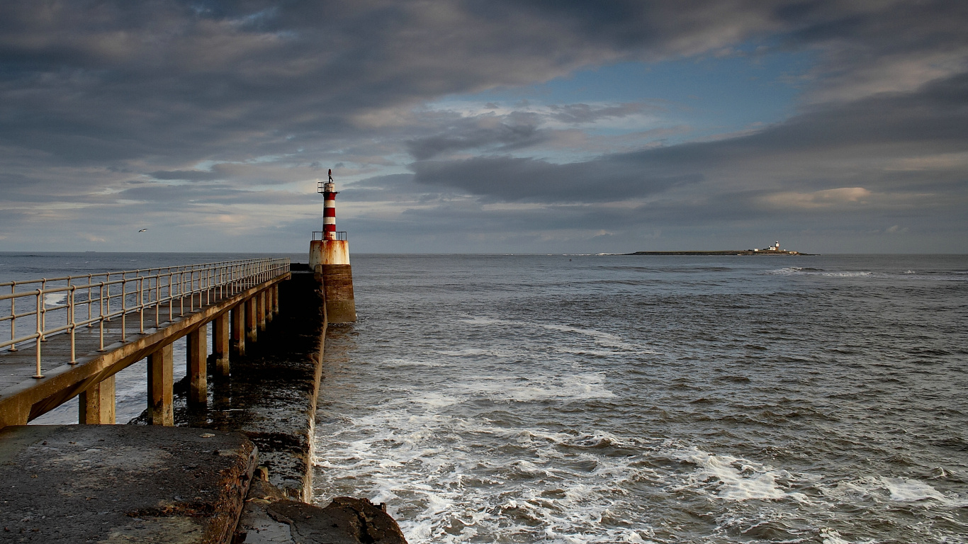 Brown Wooden Dock on Sea Under Gray Clouds During Daytime. Wallpaper in 1366x768 Resolution
