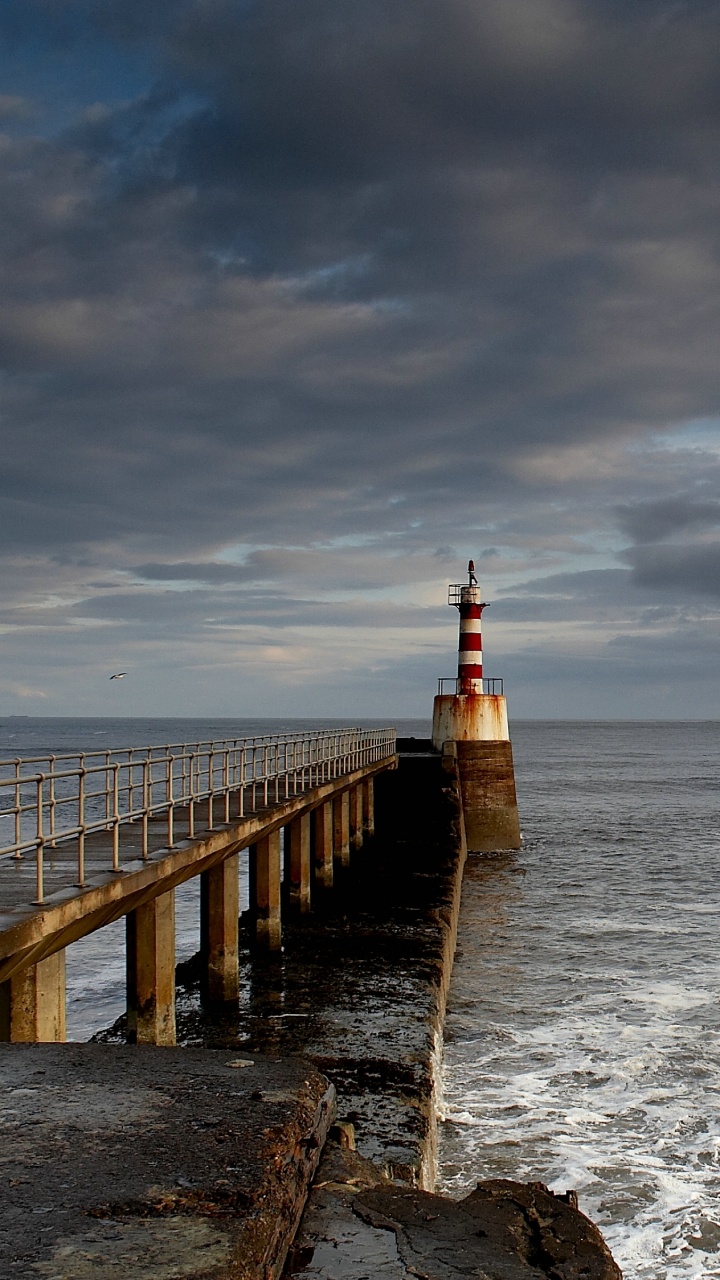 Brown Wooden Dock on Sea Under Gray Clouds During Daytime. Wallpaper in 720x1280 Resolution