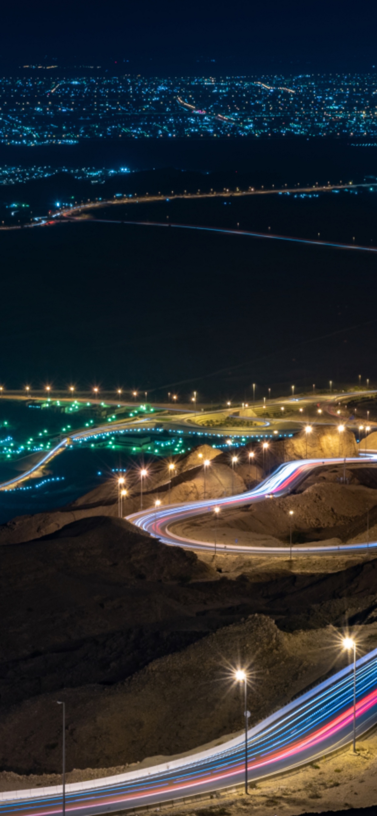 Aerial View of City During Night Time. Wallpaper in 1242x2688 Resolution