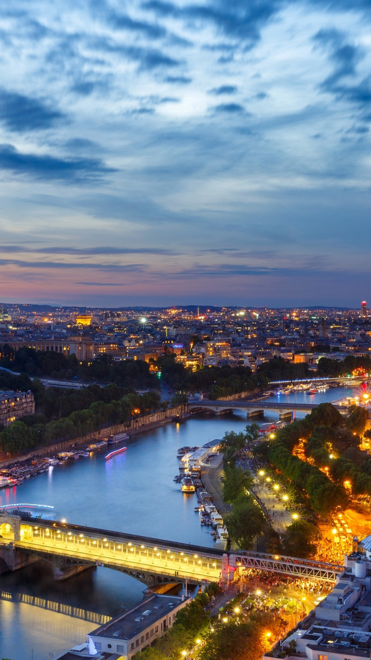 Aerial View of City Buildings During Night Time. Wallpaper in 750x1334 Resolution
