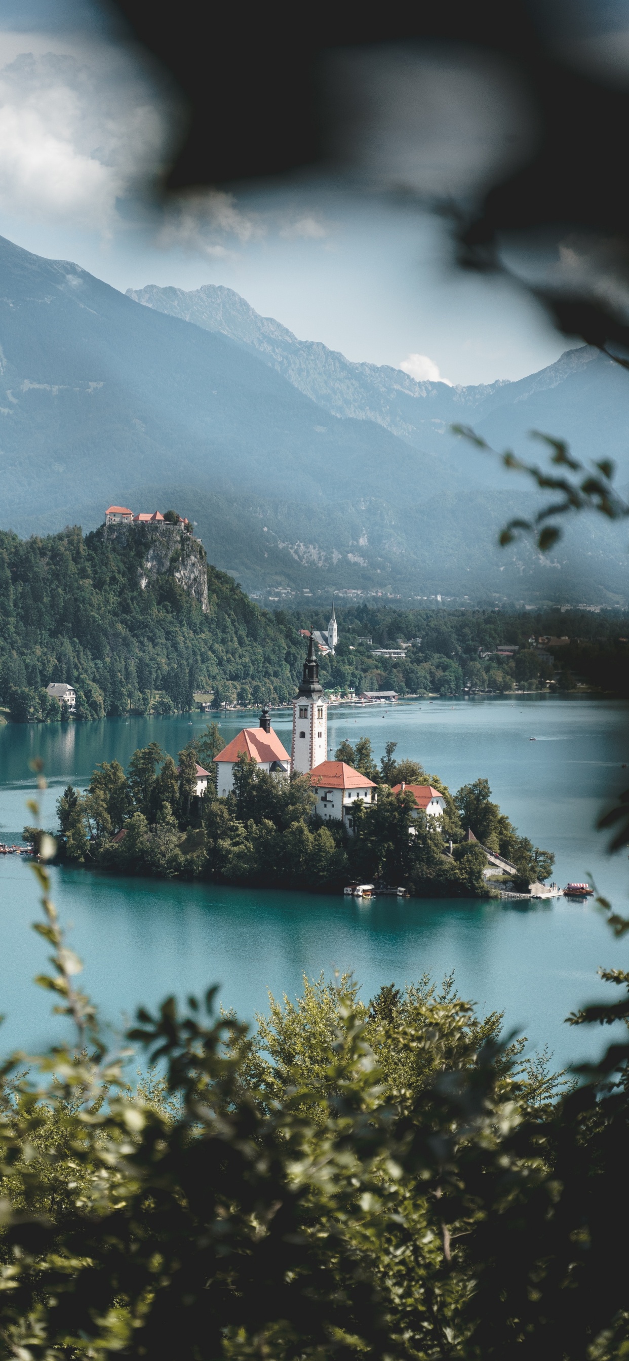 Body of Water Near Mountain During Daytime. Wallpaper in 1242x2688 Resolution