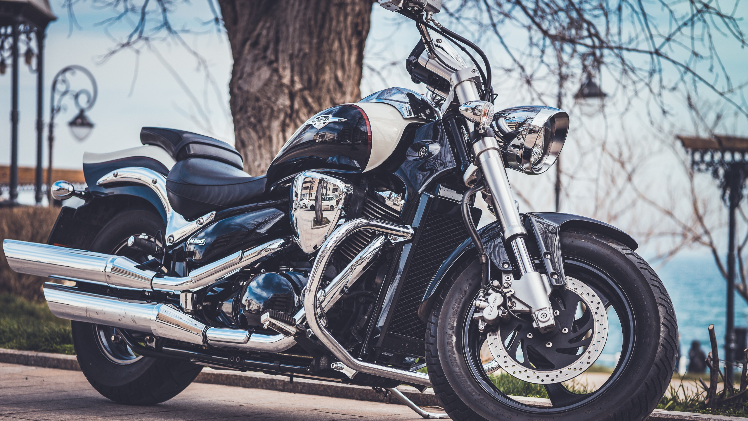 Blue and Black Sports Bike Parked on Gray Concrete Road During Daytime. Wallpaper in 2560x1440 Resolution