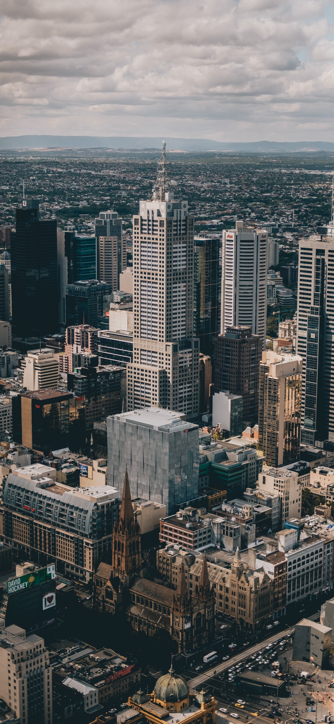 Aerial View of City Buildings During Daytime. Wallpaper in 1125x2436 Resolution