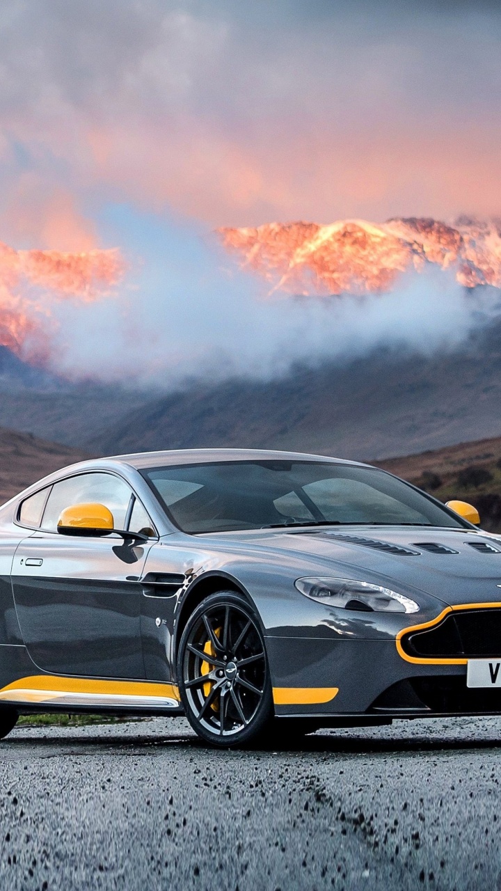 Porsche 911 Noire Sur Route Asphaltée Grise Pendant la Journée. Wallpaper in 720x1280 Resolution