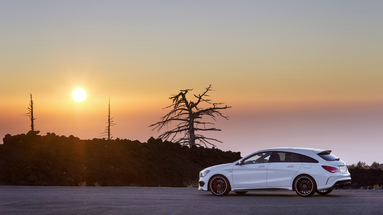 White Sedan on Snow Covered Road During Sunset. Wallpaper in 1280x720 Resolution