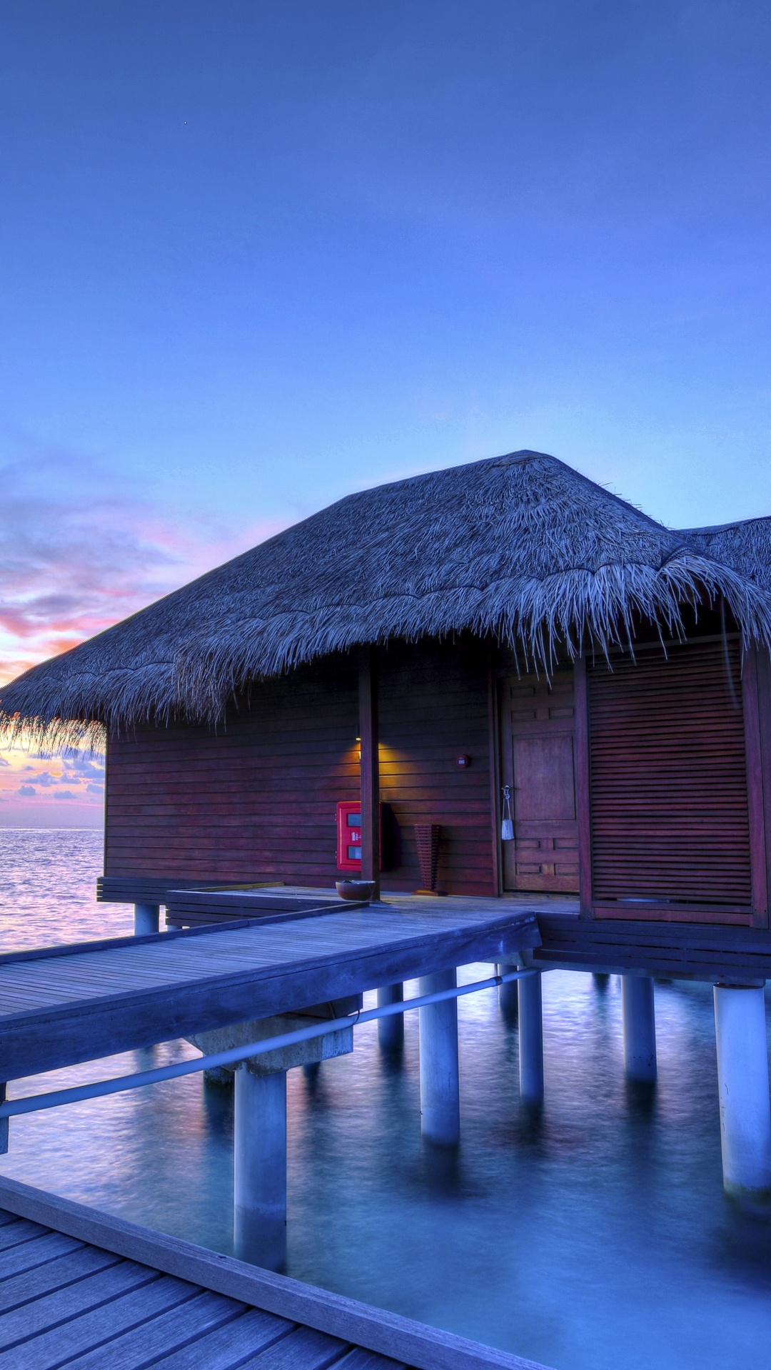 Brown Wooden House on Sea Dock During Daytime. Wallpaper in 1080x1920 Resolution