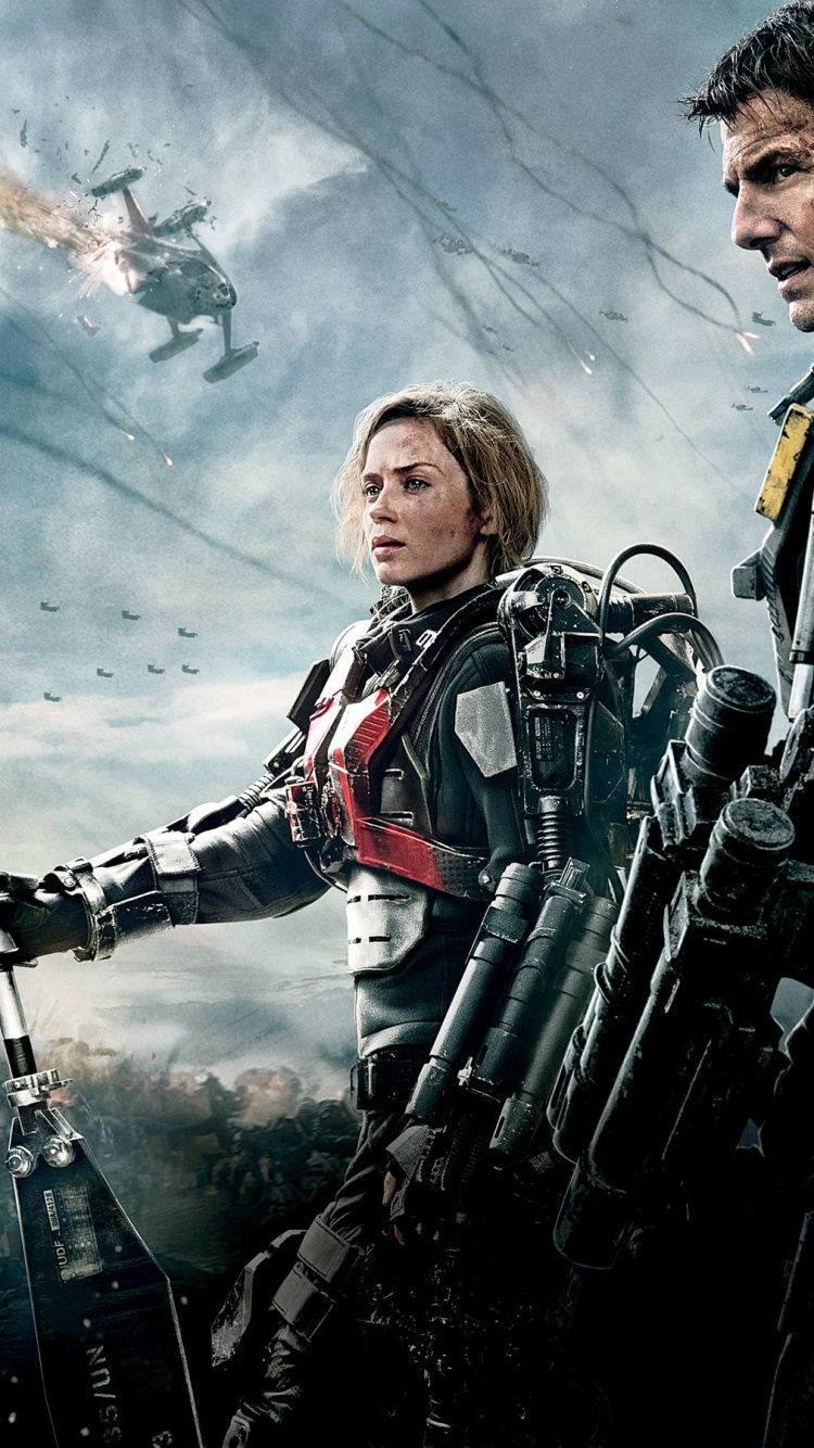 Man in Black and Red Jacket Holding Black and Green Rifle. Wallpaper in 750x1334 Resolution