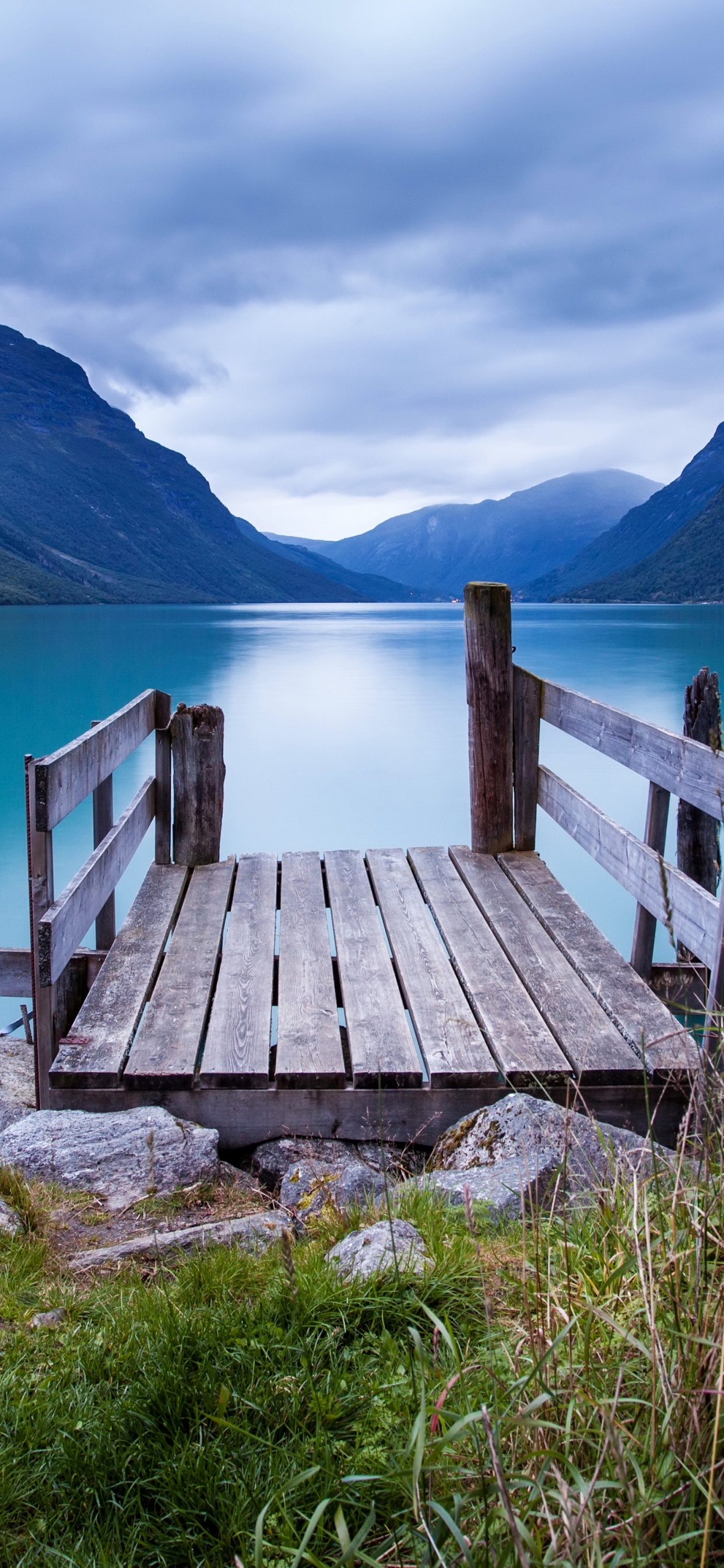 Brown Wooden Bench on Dock Near Lake During Daytime. Wallpaper in 1242x2688 Resolution