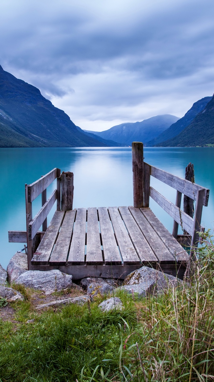 Brown Wooden Bench on Dock Near Lake During Daytime. Wallpaper in 720x1280 Resolution