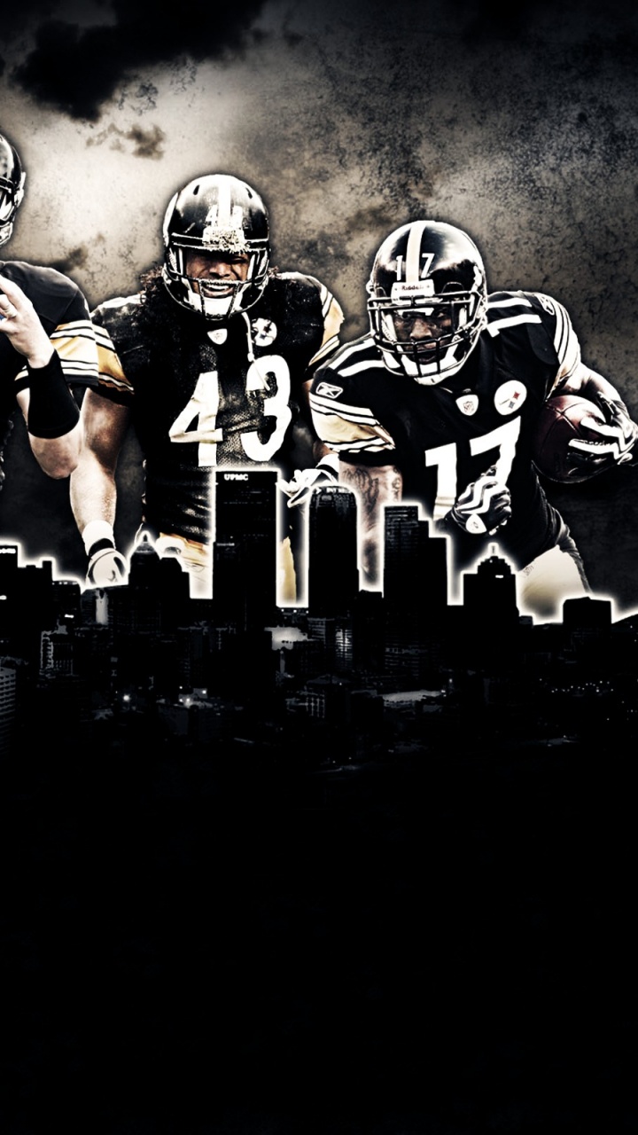 Fußballspieler in Schwarz-weißer Uniform. Wallpaper in 720x1280 Resolution