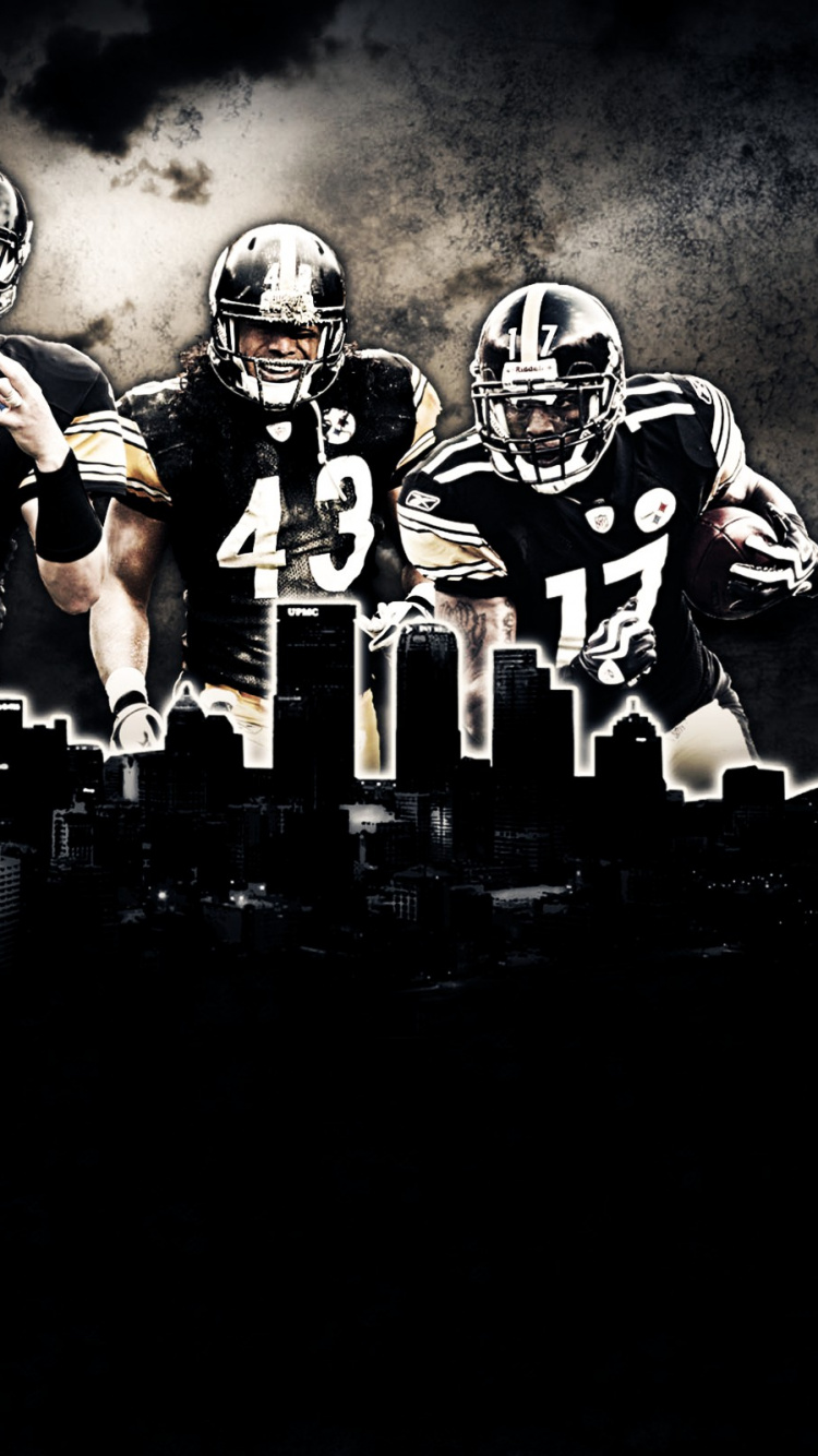 Fußballspieler in Schwarz-weißer Uniform. Wallpaper in 750x1334 Resolution