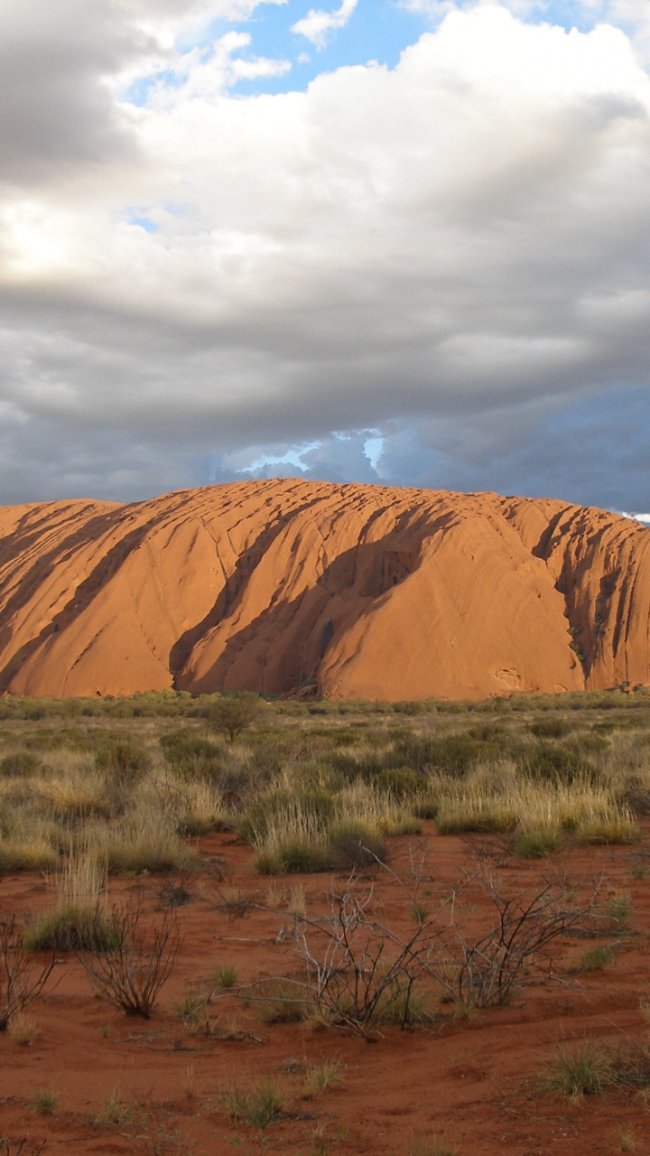 Brown Mountain Under White Clouds During Daytime. Wallpaper in 720x1280 Resolution