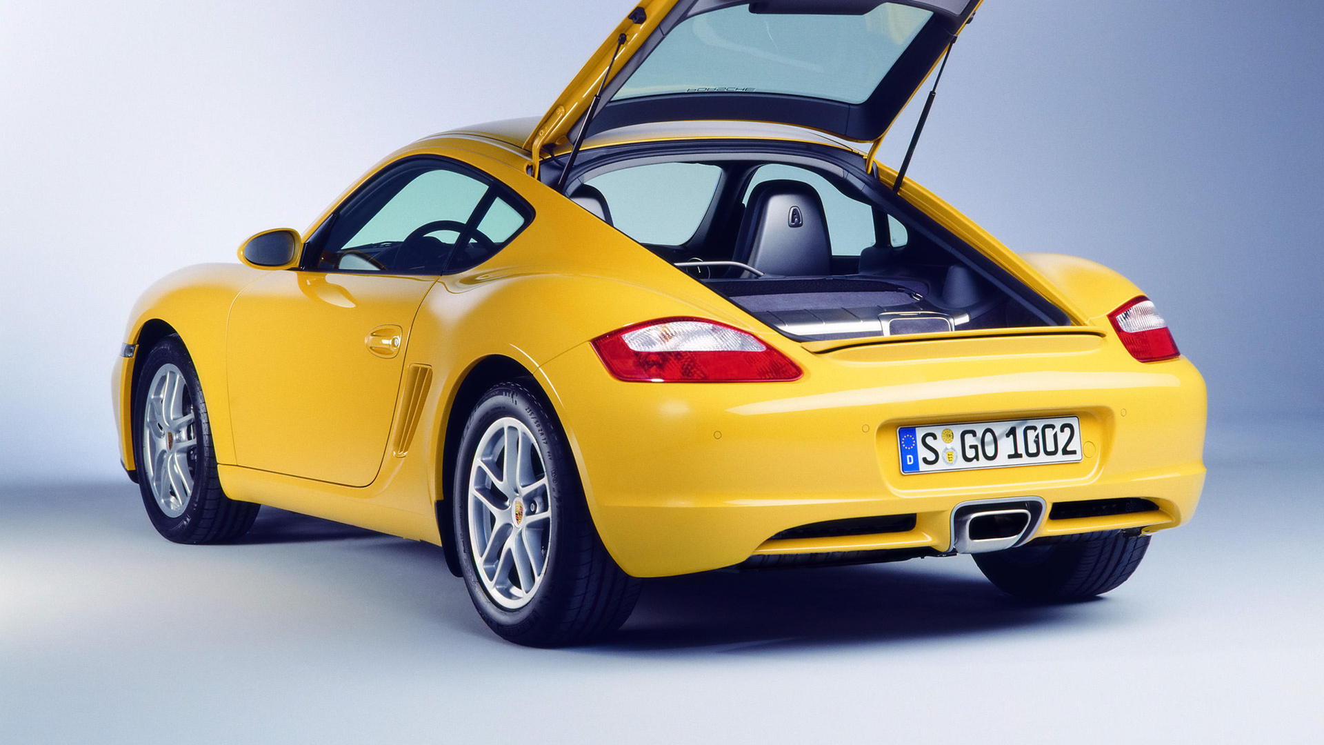 Orange Porsche 911 Auf Weißem Hintergrund. Wallpaper in 1920x1080 Resolution