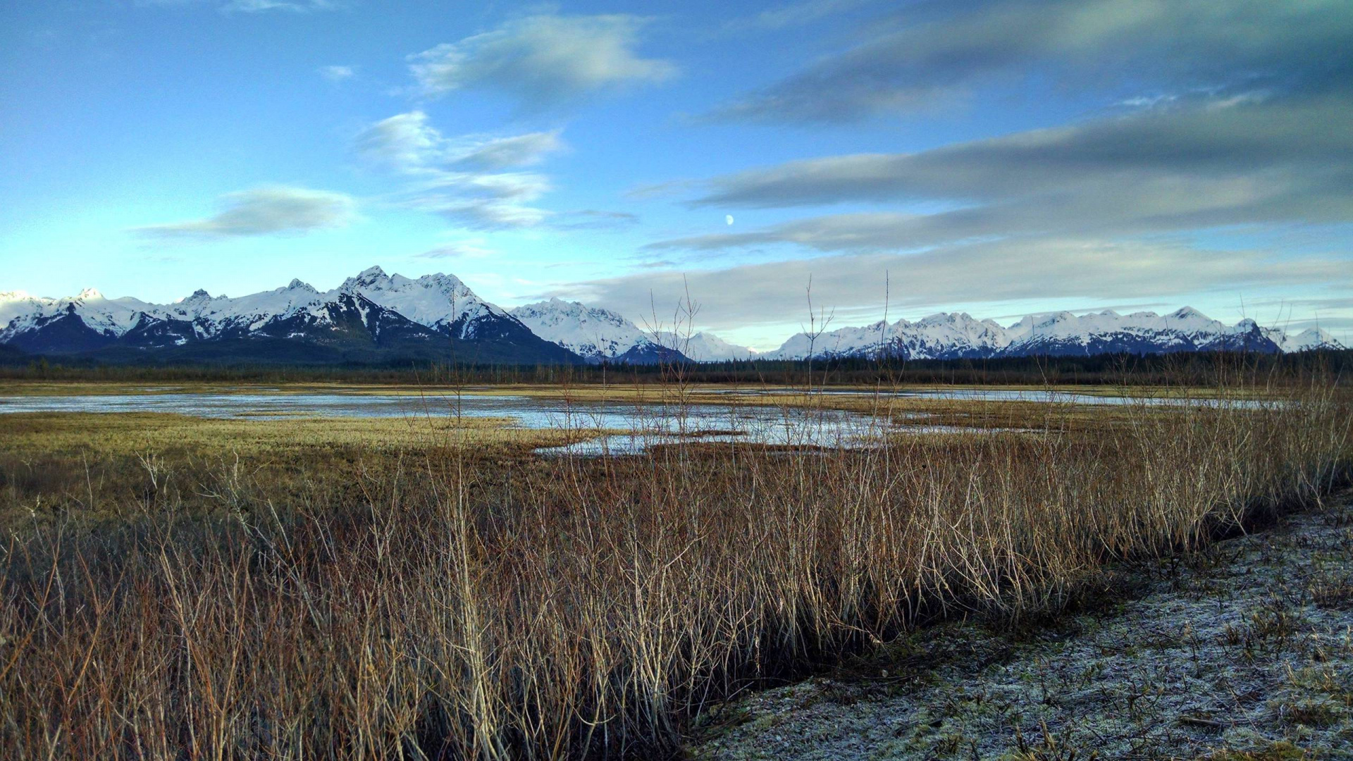 Brown Grass Field Near Lake Under Blue Sky During Daytime. Wallpaper in 1920x1080 Resolution