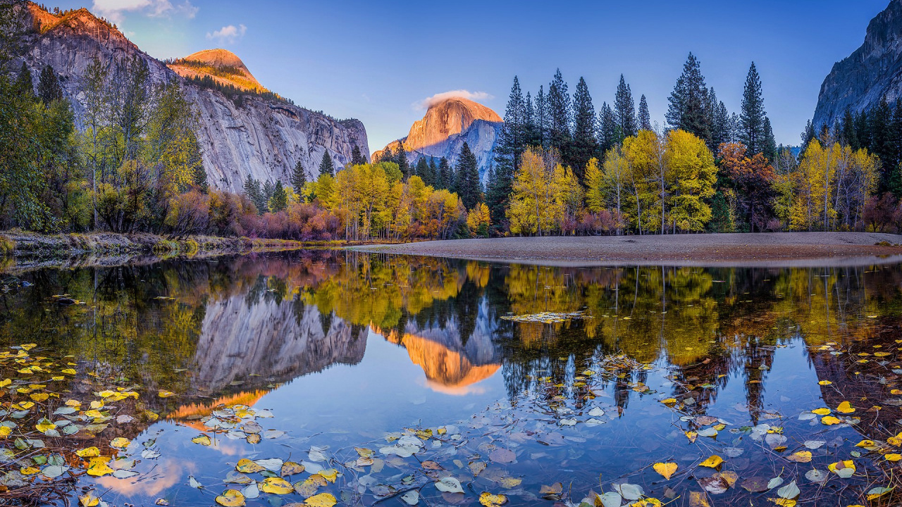 Green Trees Near Lake and Mountain Under Blue Sky During Daytime. Wallpaper in 1280x720 Resolution