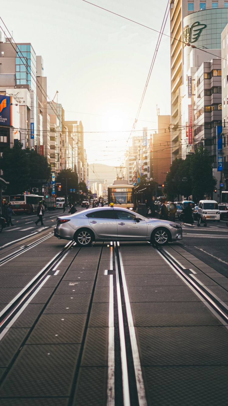 Cars, Wheel, Tire, Daytime, Building. Wallpaper in 750x1334 Resolution