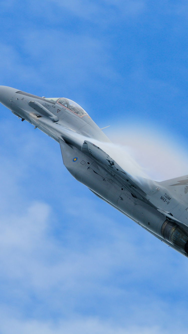 Gray Jet Plane in Mid Air During Daytime. Wallpaper in 750x1334 Resolution