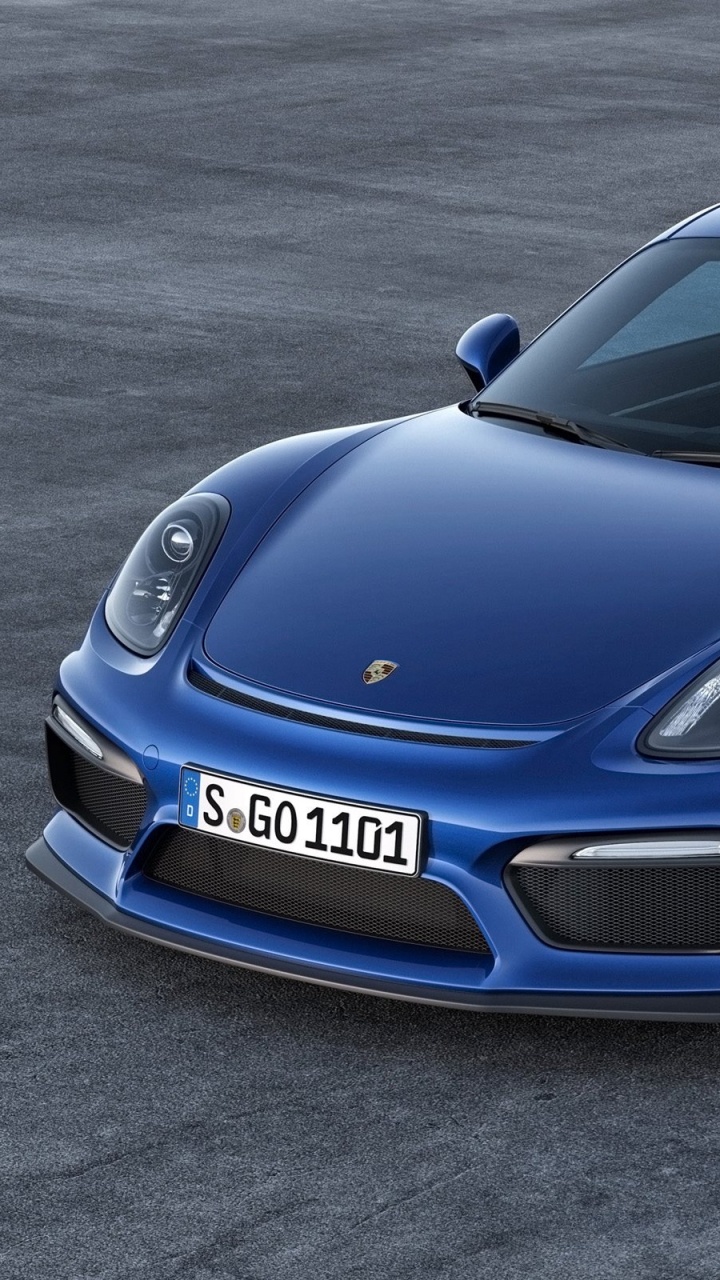 Blauer Porsche 911 Unterwegs. Wallpaper in 720x1280 Resolution