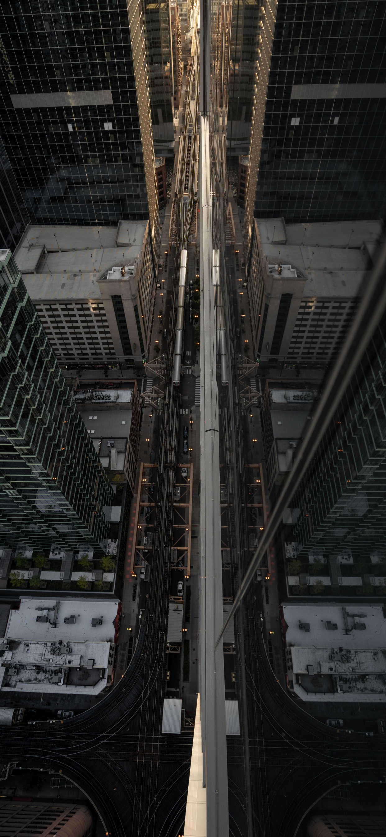 Un Alto Ángulo de Vista de Los Edificios de la Ciudad Durante el Día.. Wallpaper in 1242x2688 Resolution