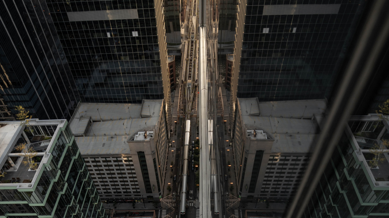 Un Alto Ángulo de Vista de Los Edificios de la Ciudad Durante el Día.. Wallpaper in 1280x720 Resolution