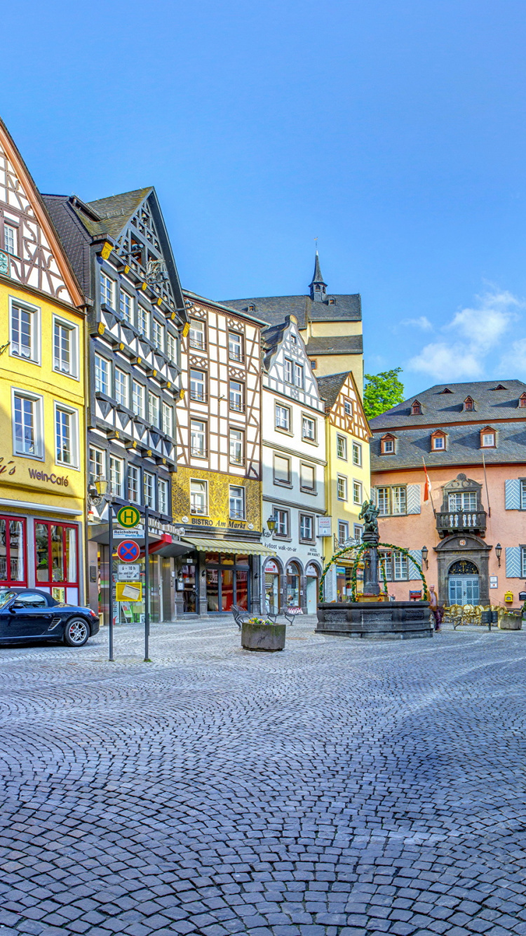 Cars Parked Beside Road Near Buildings During Daytime. Wallpaper in 750x1334 Resolution