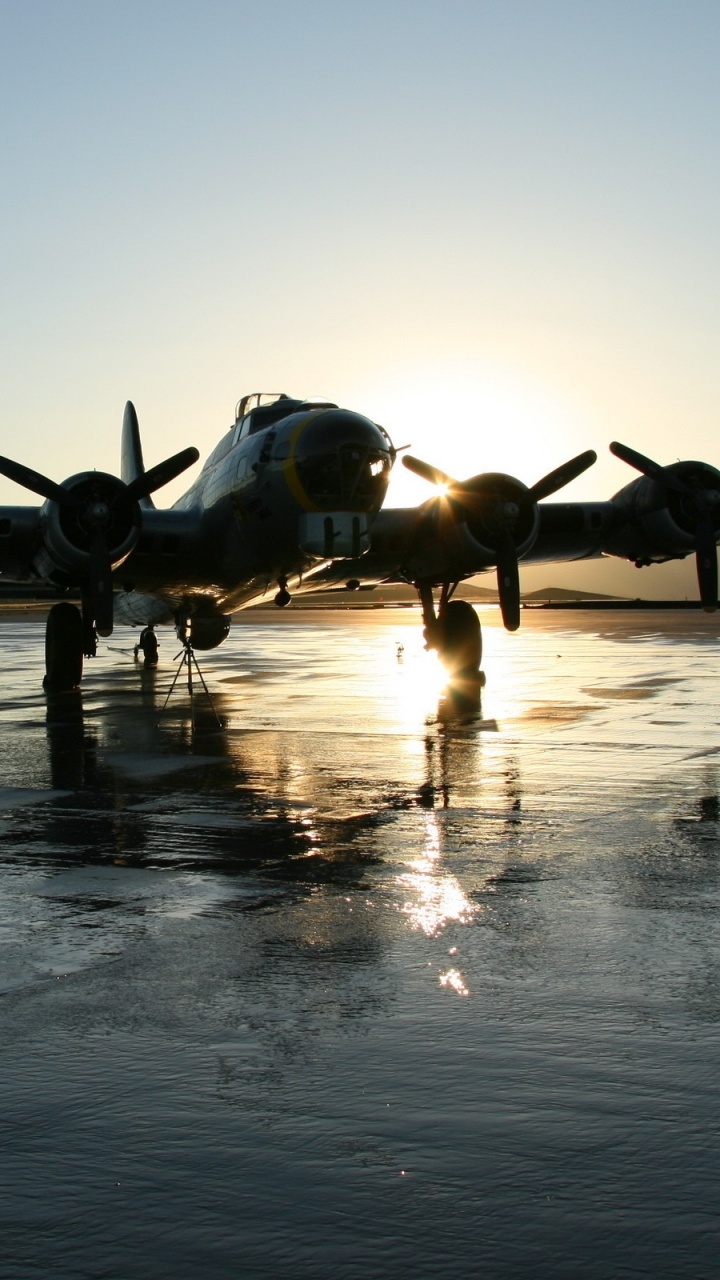 Black Fighter Plane on The Sea During Daytime. Wallpaper in 720x1280 Resolution