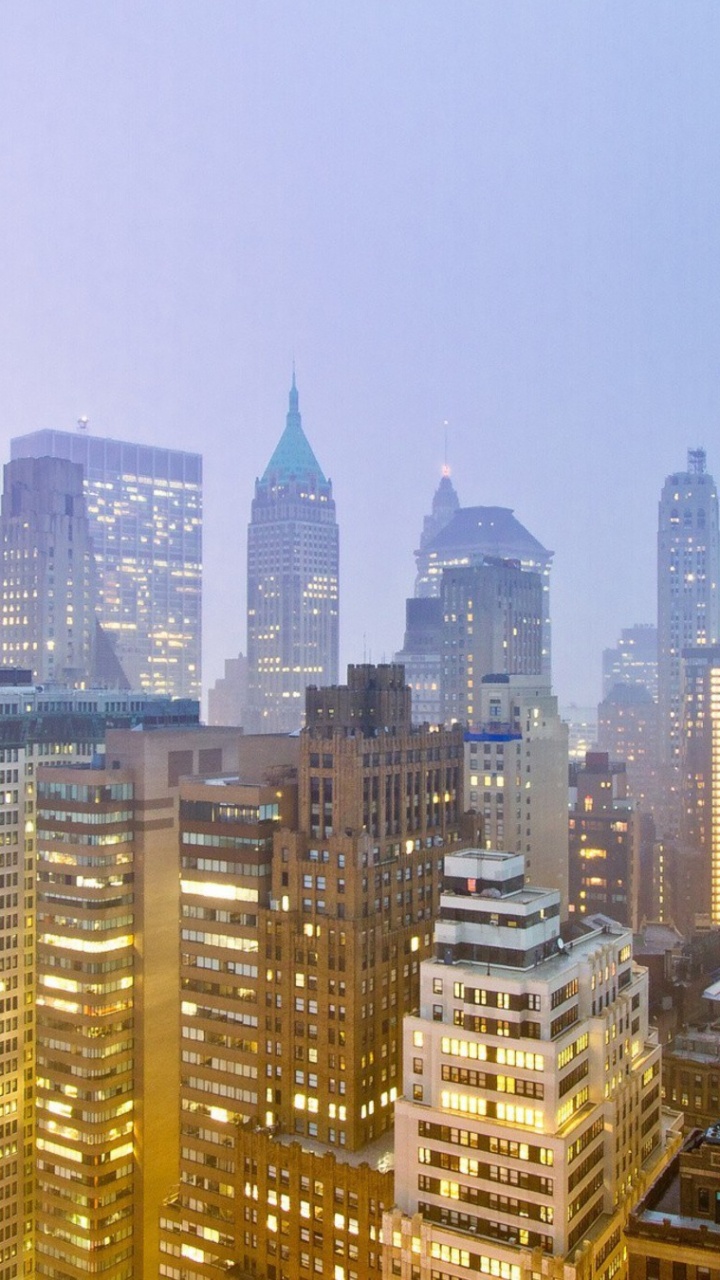 City Skyline During Night Time. Wallpaper in 720x1280 Resolution