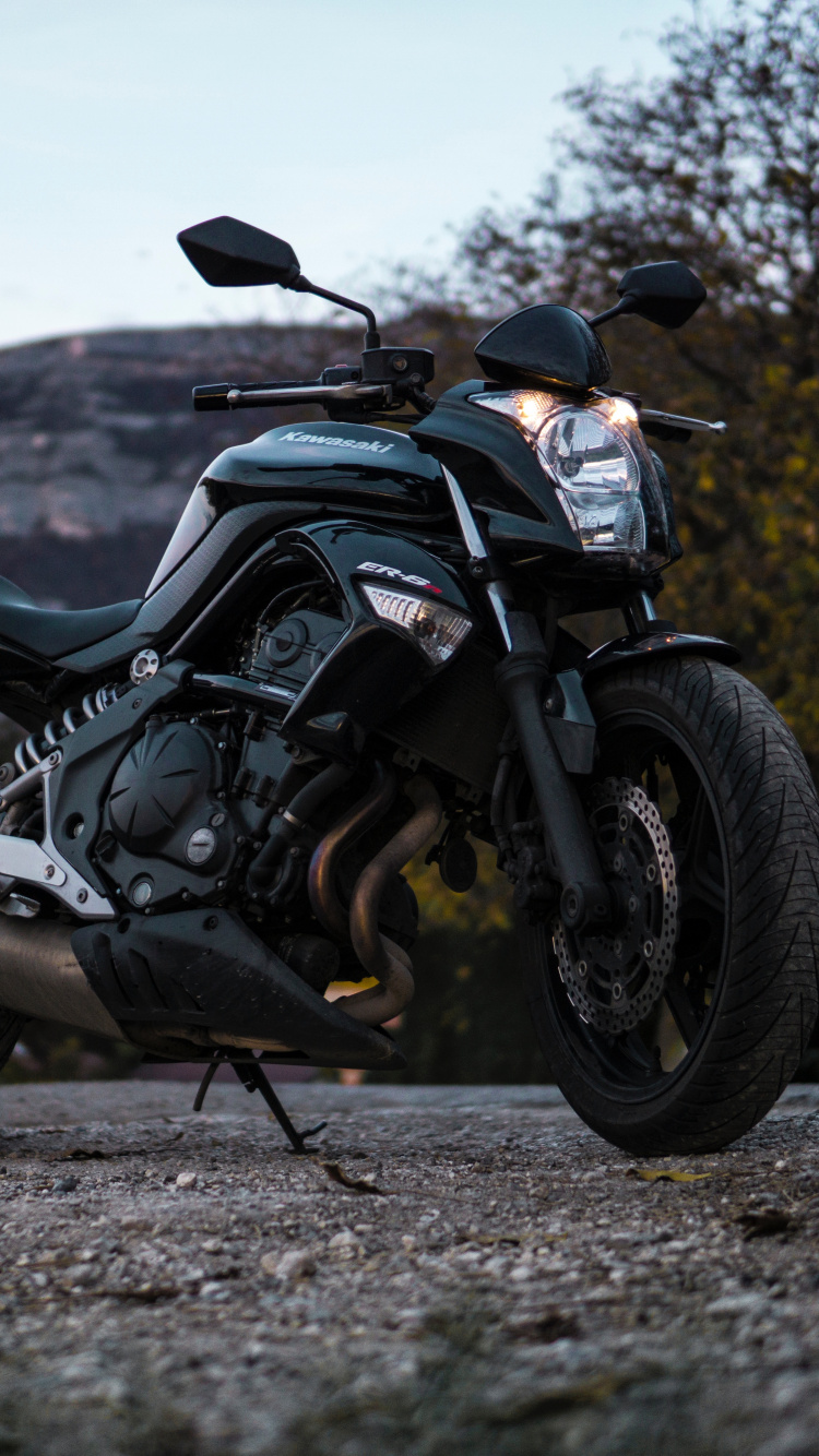 Black and Gray Motorcycle on Dirt Road During Daytime. Wallpaper in 750x1334 Resolution