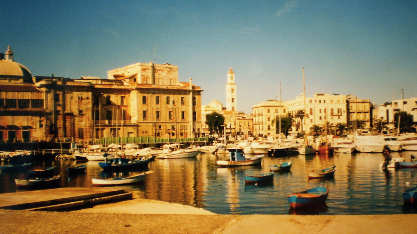 Boats on Dock Near Buildings During Daytime. Wallpaper in 1366x768 Resolution