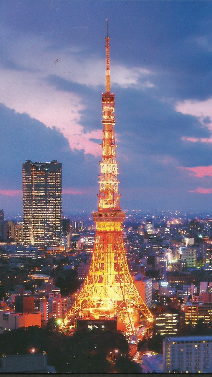 Eiffelturm in Paris Während Der Nacht. Wallpaper in 720x1280 Resolution