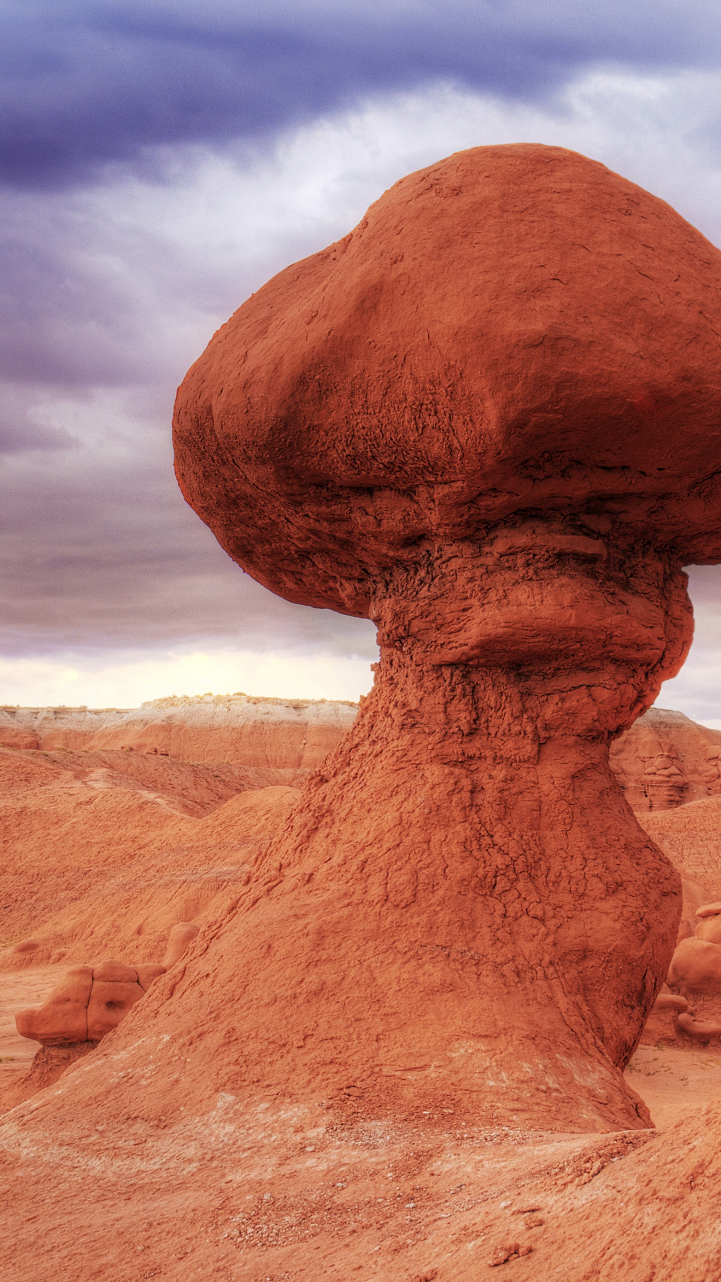 Brown Rock Formation Under Blue Sky. Wallpaper in 1440x2560 Resolution