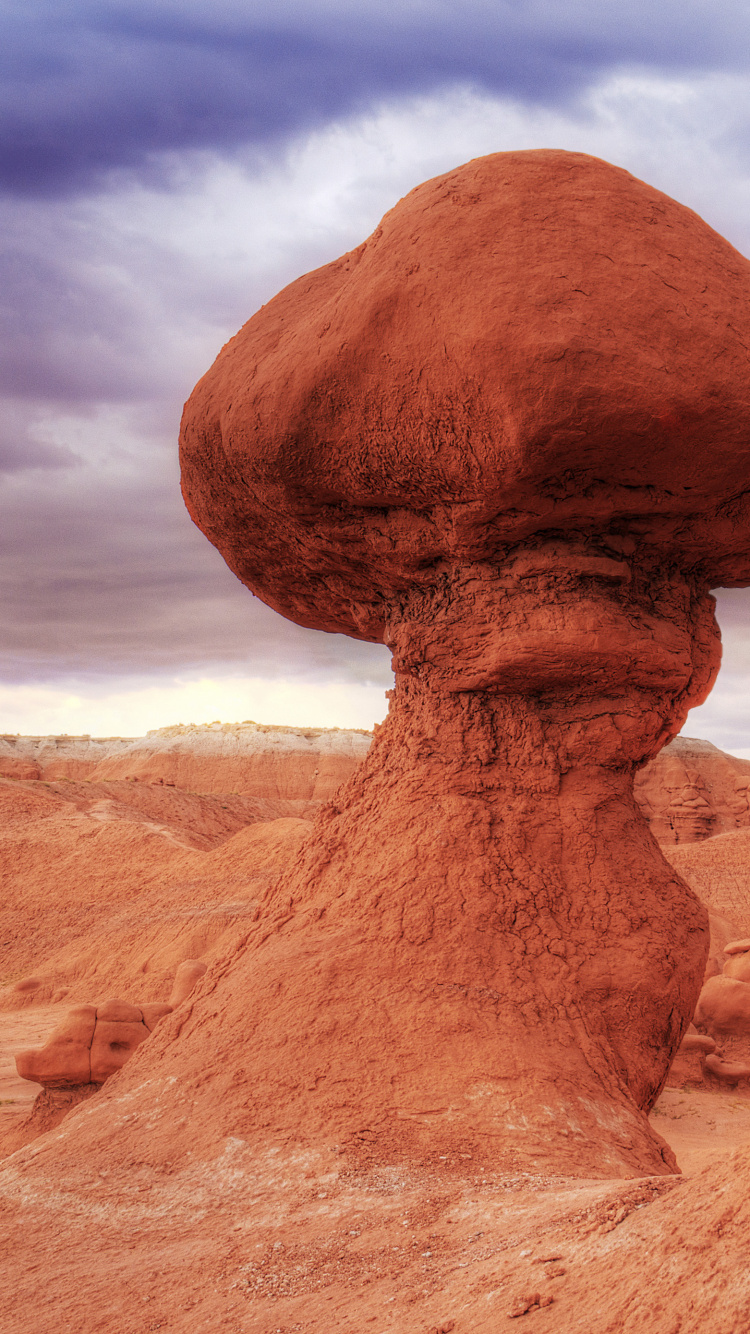 Brown Rock Formation Under Blue Sky. Wallpaper in 750x1334 Resolution