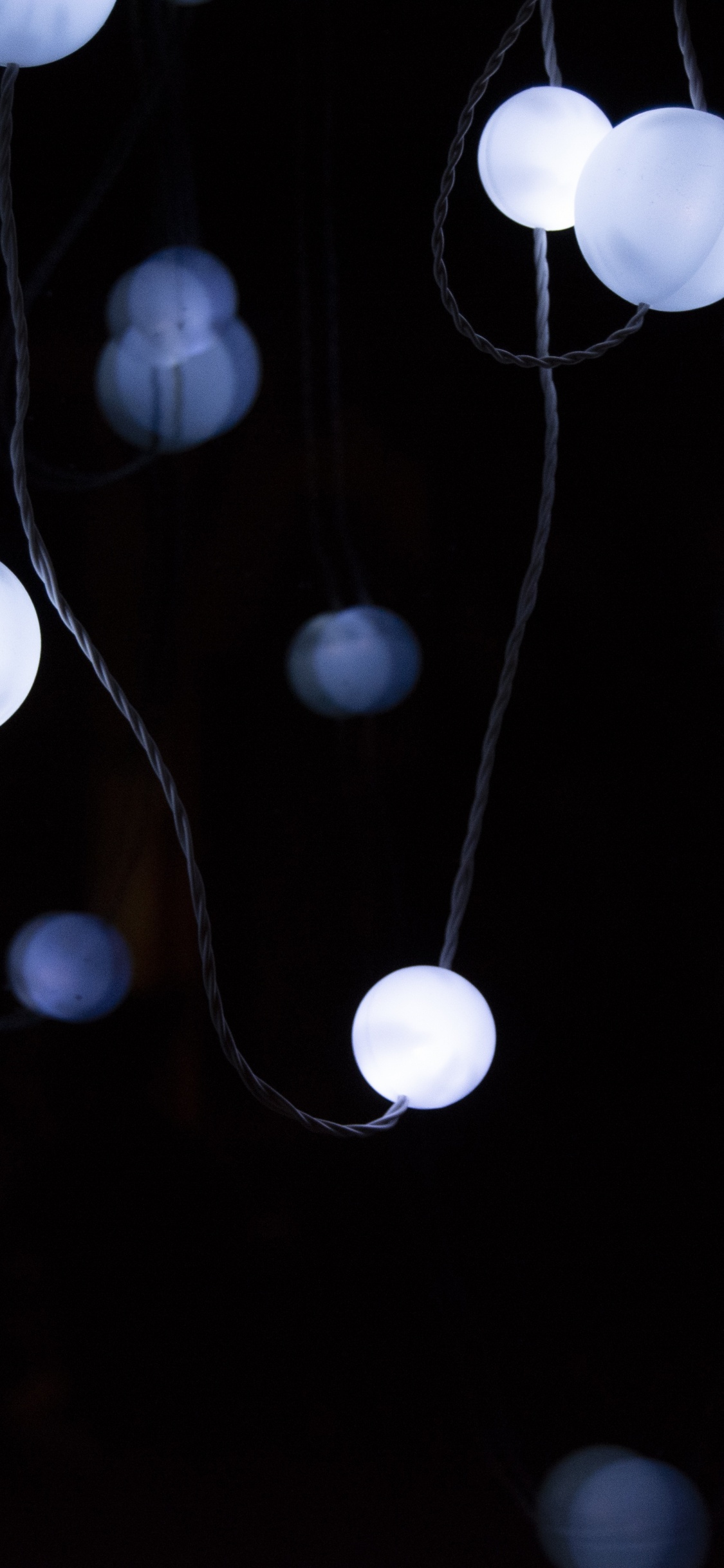 White and Blue Balloons on Water. Wallpaper in 1125x2436 Resolution