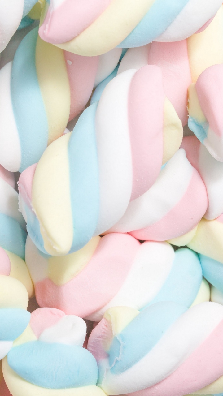 Bonbons en Forme de Coeur Rose Bleu et Jaune. Wallpaper in 720x1280 Resolution