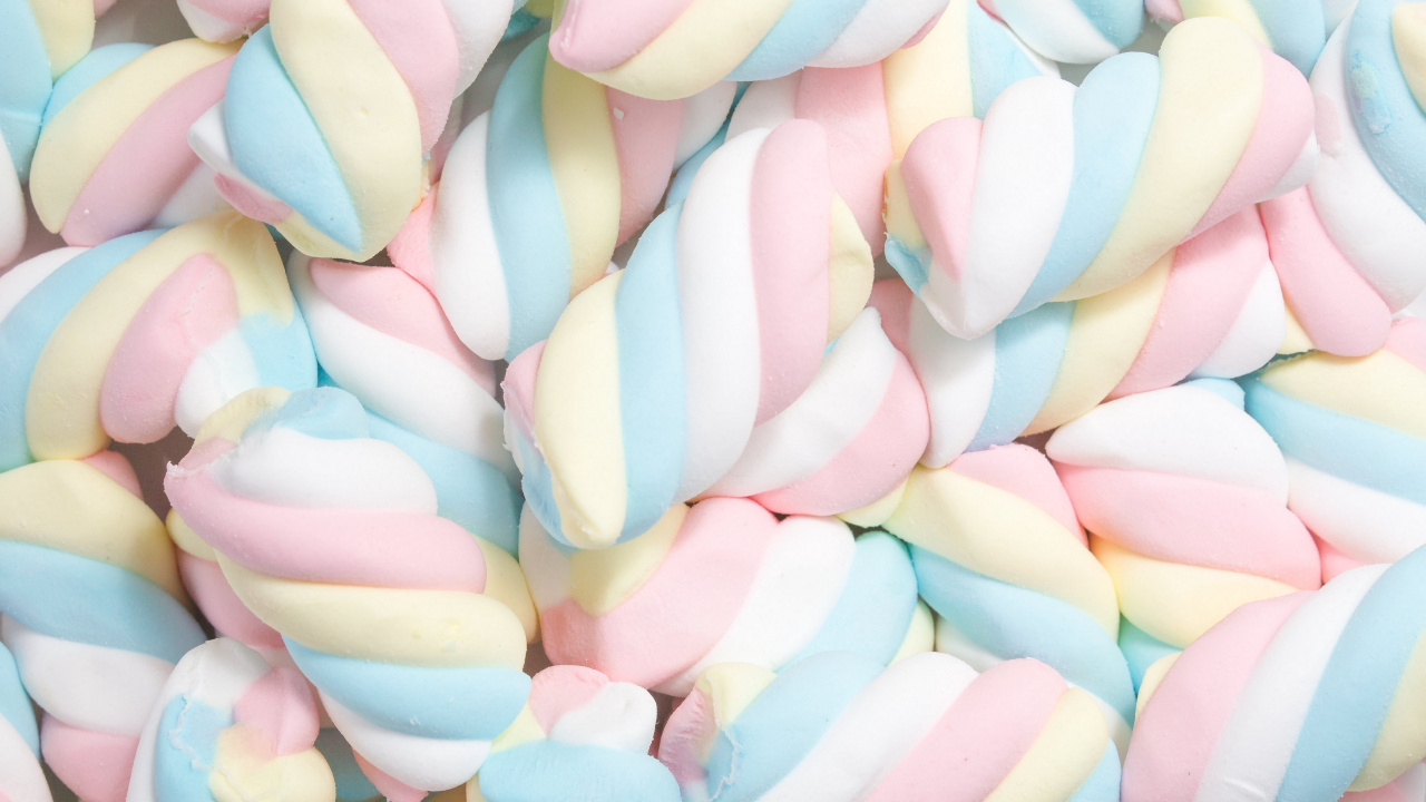 Pink Blue and Yellow Heart Shaped Candies. Wallpaper in 1280x720 Resolution