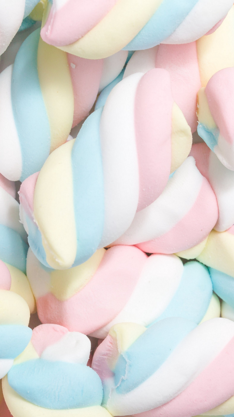 Pink Blue and Yellow Heart Shaped Candies. Wallpaper in 750x1334 Resolution