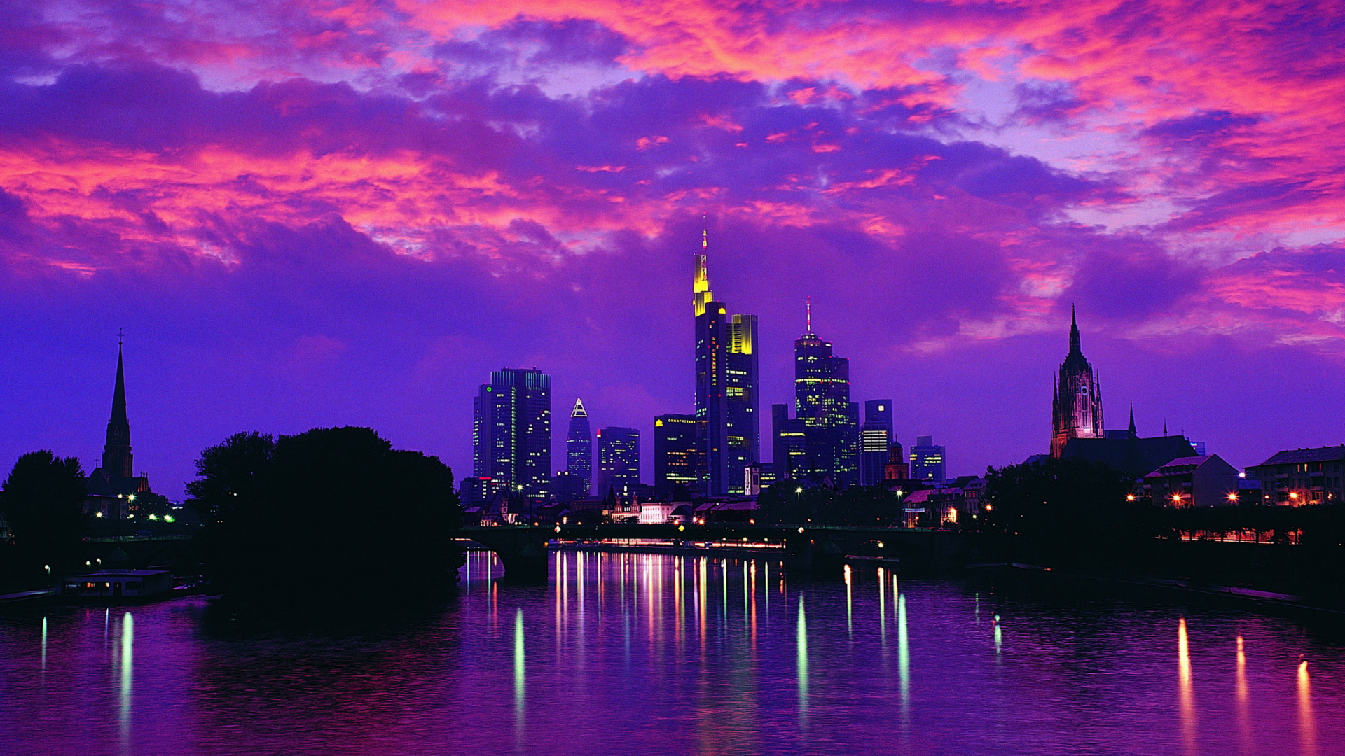 City Skyline Across Body of Water During Night Time. Wallpaper in 1920x1080 Resolution