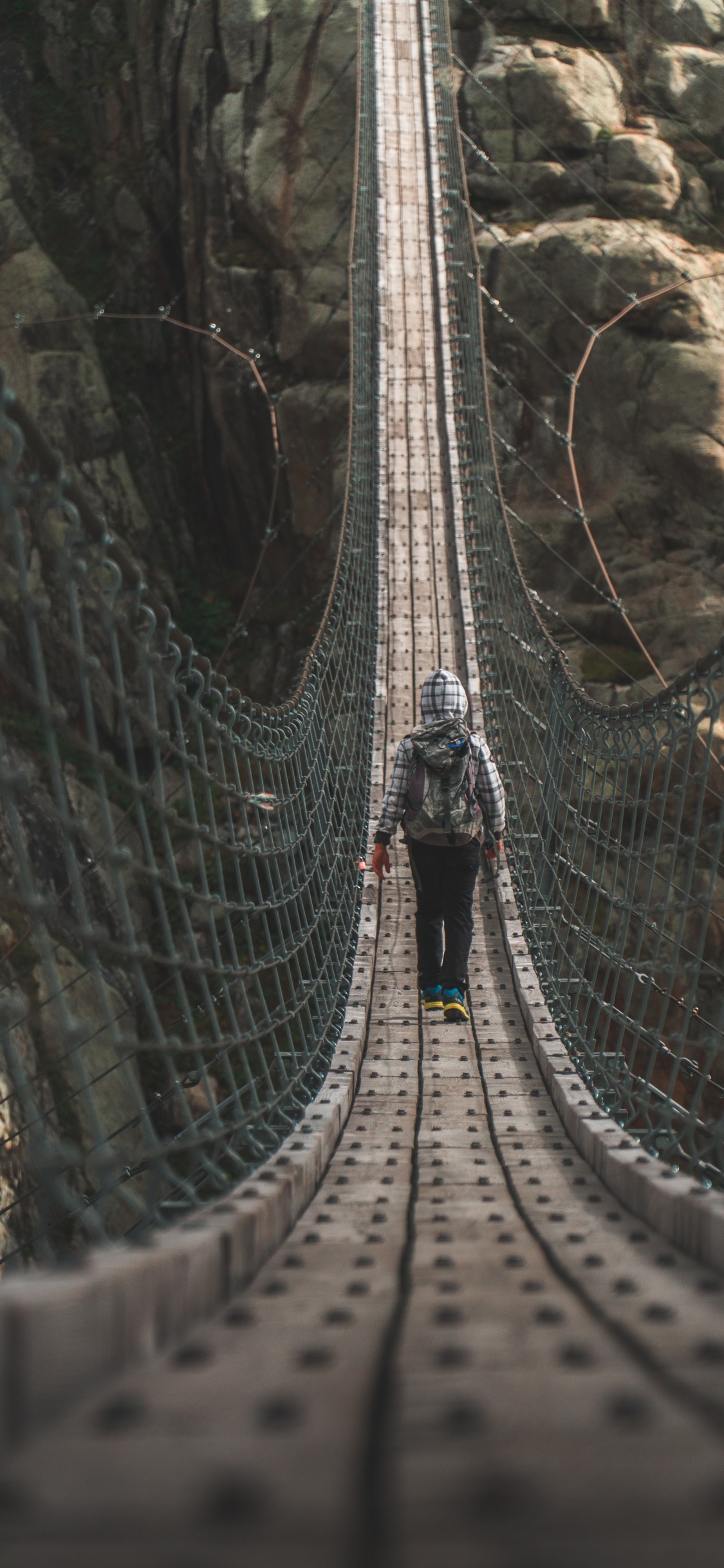People Walking on Hanging Bridge During Daytime. Wallpaper in 1125x2436 Resolution
