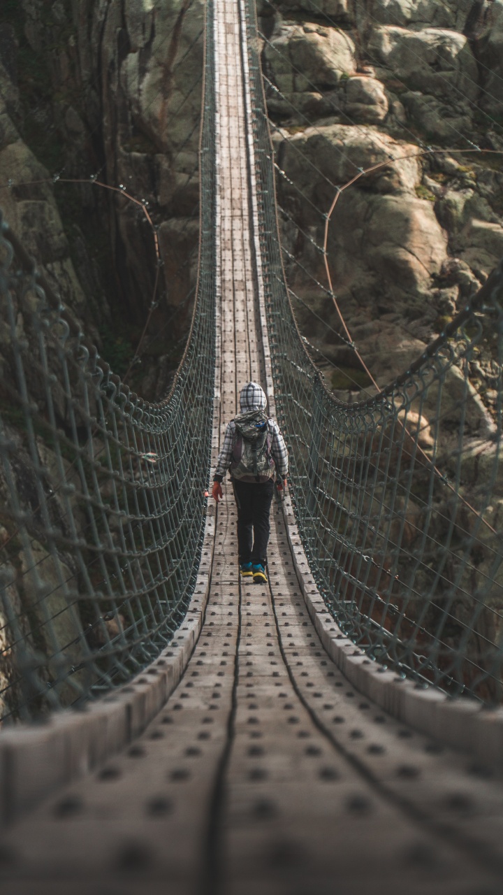 People Walking on Hanging Bridge During Daytime. Wallpaper in 720x1280 Resolution