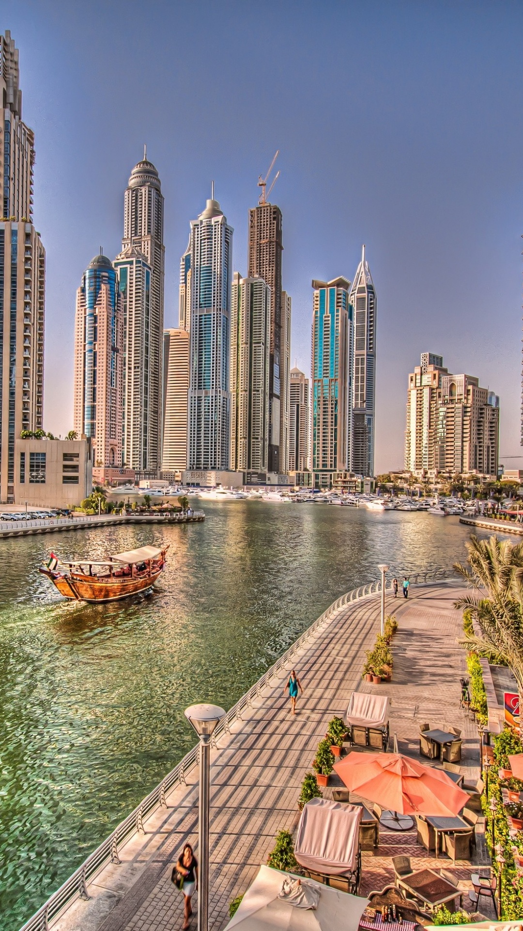 Red and White Boat on Water Near City Buildings During Daytime. Wallpaper in 1080x1920 Resolution
