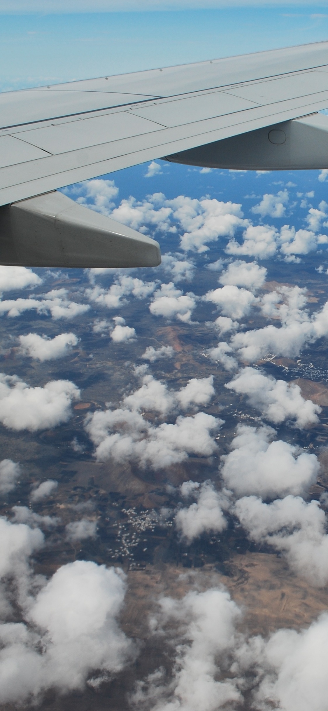 White Clouds and Blue Sky During Daytime. Wallpaper in 1125x2436 Resolution